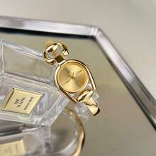 Shein - 1pc Golden Women's Simple Horseshoe Shaped Watch Case, Colorful Dial, Metallic Alloy Watchband, Fashionable Quartz Watch For Daily Wear