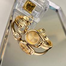 Shein - 1pc Golden Women's Simple Horseshoe Shaped Watch Case, Colorful Dial, Metallic Alloy Watchband, Fashionable Quartz Watch For Daily Wear