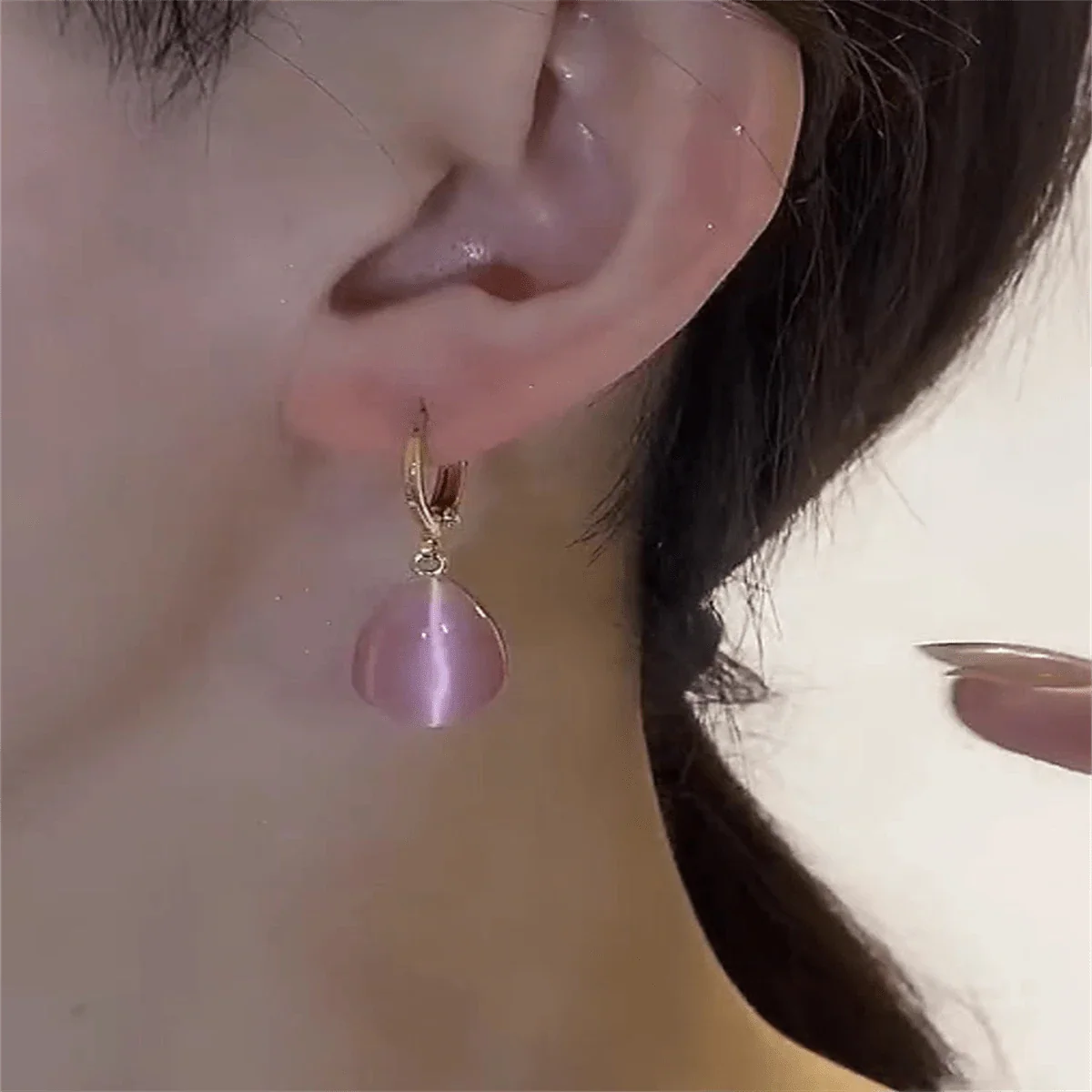 Shein - 2024 New Trendy Pink Water Drop Double-Side Cat's Eye Stone Earrings