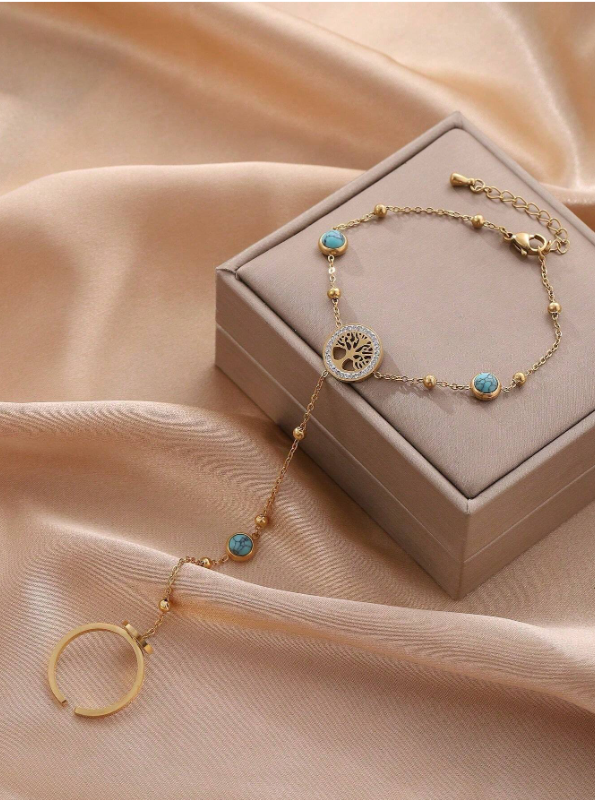 Shein - A Stylish And Versatile Titanium Steel Tree Of Life Hand Chain